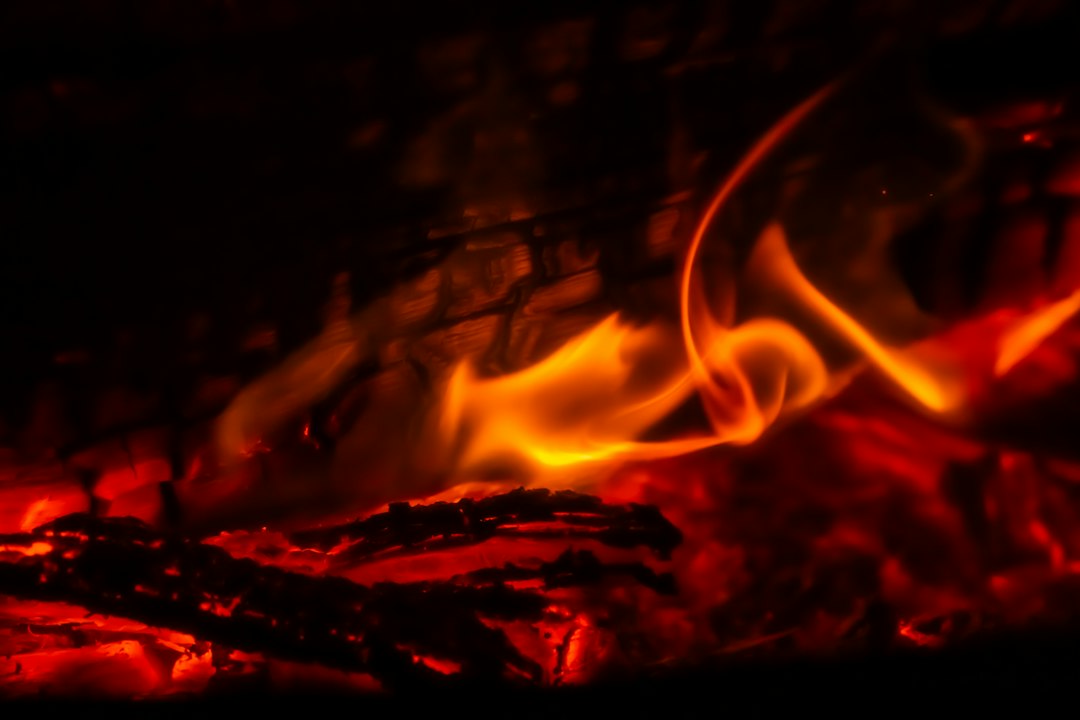 A close up of a fire burning in a fireplace
